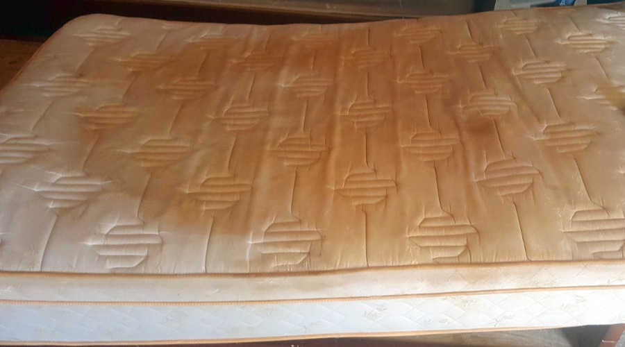 badly soiled mattress